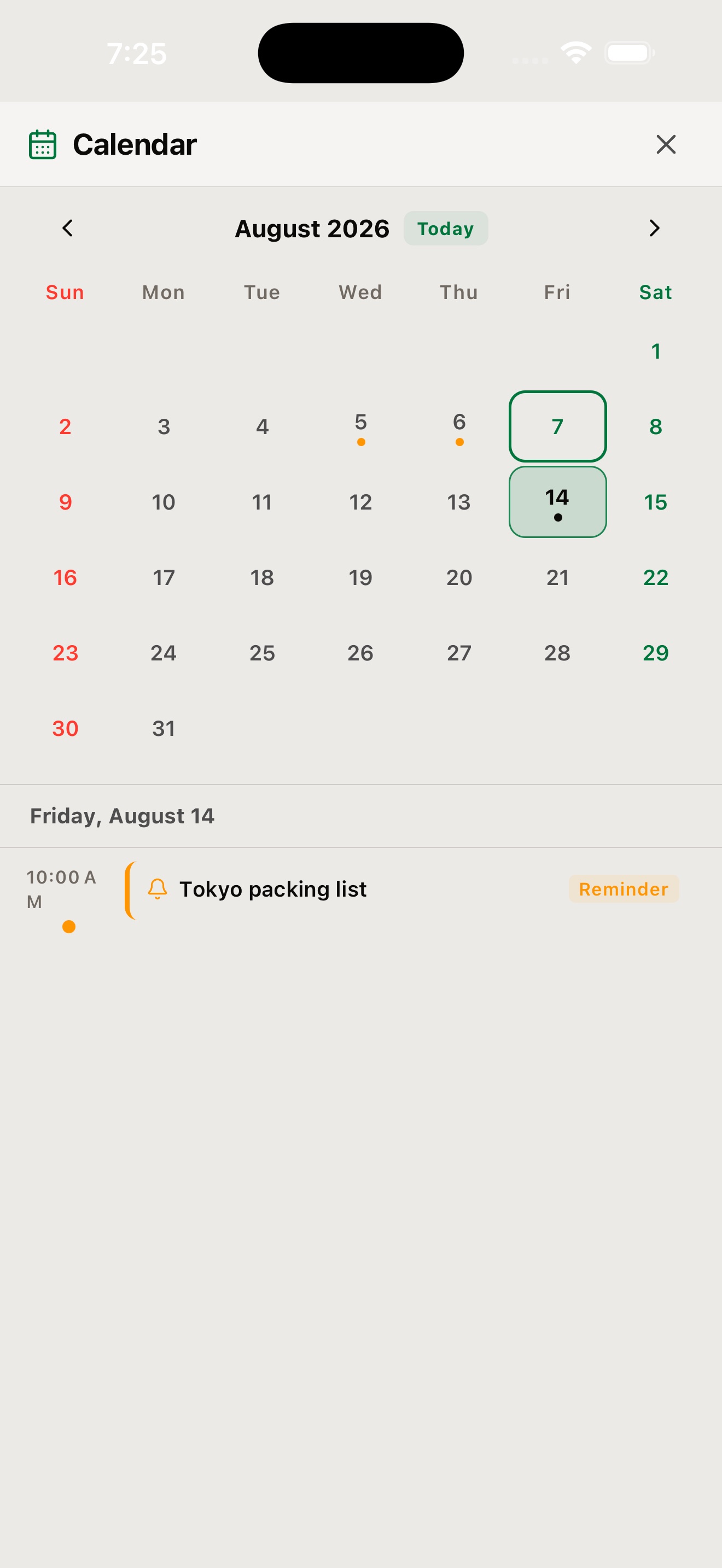 The calendar view: a month grid for August 2026 with dots on days that have entries, and below it the agenda for Friday, August 14 showing a 10:00 AM entry labelled Busan weekend packing list with a Reminder badge.